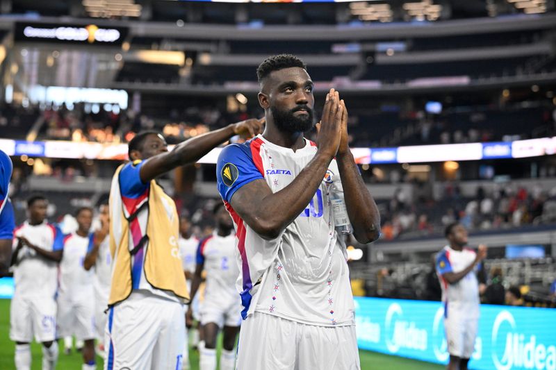 Haiti forward Frantzdy Pierrot (20) reacts with fans after the match against the United States of America during a group stage match of the 2025 Gold Cup at AT&T Stadium.