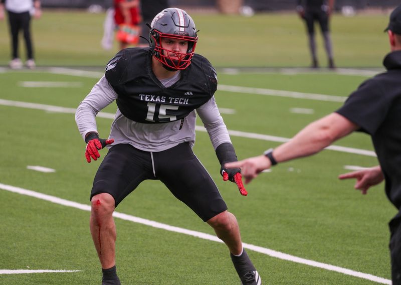 Texas Tech's Austin Romaine goes through a drill during spring football practice, Tuesday, April 14, 2026, at the Womble Football Center.
