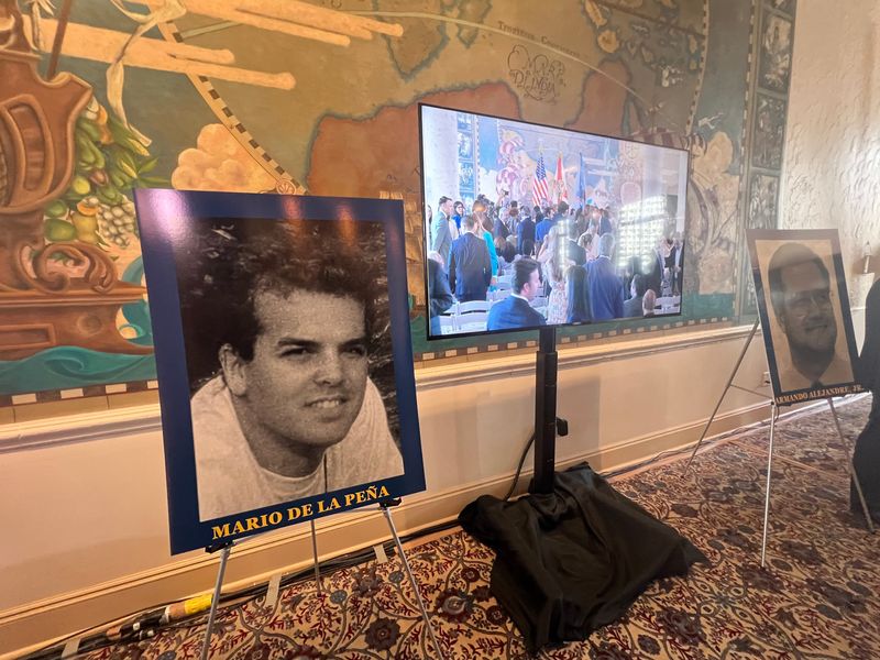 A display at the Freedom Tower in Miami on May 20, 2026, honors the four 'Brothers to the Rescue' airmen shot down in 1996 on a humanitarian flight to Cuba. Seen here is Mario De La Pena. U.S. prosecutors announced the indictment of Raul Castro in the incident that day.