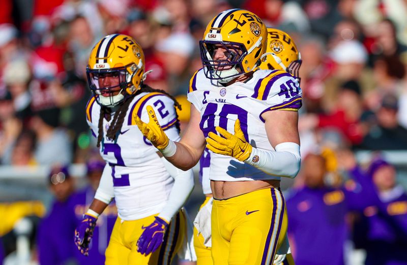 Nov 29, 2025; Norman, Oklahoma, USA; Louisiana State Tigers linebacker Whit Weeks (40) reacts during the first half against the Oklahoma Sooners at Gaylord Family-Oklahoma Memorial Stadium. Mandatory Credit: Kevin Jairaj-Imagn Images