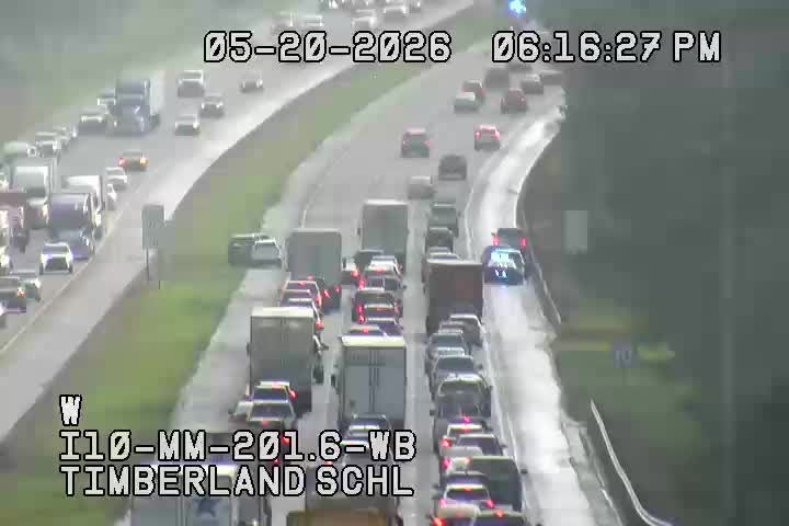 A traffic camera view of Interstate 10 at Mile Marker 201 as several vehicles were involved in accidents on May 20, 2026.