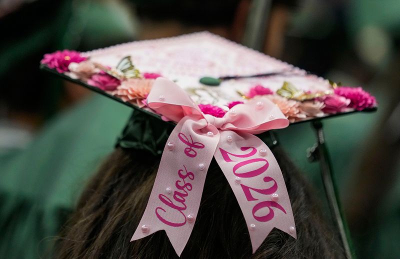 Friends and family watch as the members of the Class of 2026 takes part in their commencement ceremony at Palmetto Ridge High School in Naples, Fla., on Thursday, May 21, 2026.