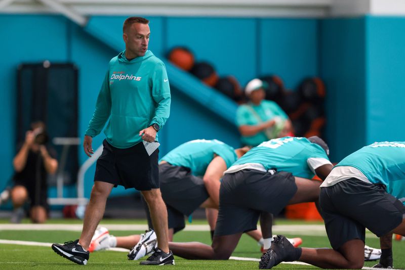 May 8, 2026; Miami Gardens, FL, USA; Miami Dolphins head coach Jeff Hafley works with his players during rookie minicamp at Baptist Health Training Complex. Mandatory Credit: Sam Navarro-Imagn Images