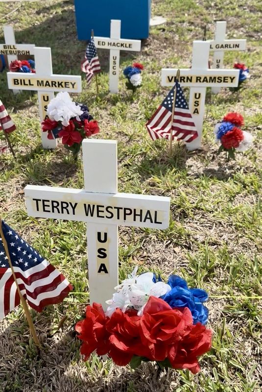 Wooden crosses represent deceased veterans who were members of Amvets Post 2 in Edgewater. Volunteers posted the crosses on May 22, 2026, in front of the post in preparation for Memorial Day.