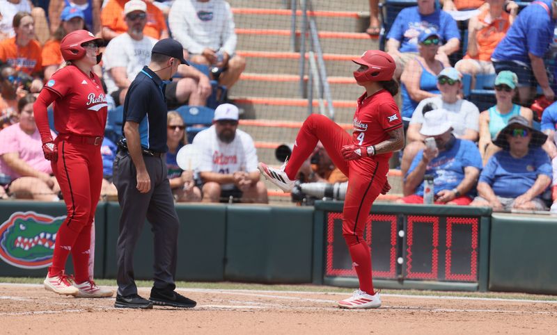 Texas Tech catcher Lagi Quiroga (4) celebrates a home run during the super regional game of the NCAA Division 1 softball championship at Katie Seashole Pressly Stadium in Gainesville, FL on Friday, May 22, 2026. [Alan Youngblood/Gainesville Sun]