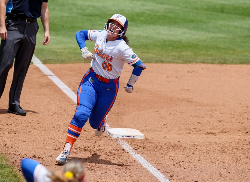 Florida starting pitcher/relief pitcher Ava Brown (00) celebrates a home run during the super regional game of the NCAA Division 1 softball championship at Katie Seashole Pressly Stadium in Gainesville, FL on Friday, May 22, 2026. [Alan Youngblood/Gainesville Sun]