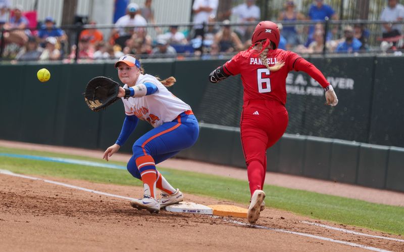 Florida infielder Madison Walker (24) gets Texas Tech third baseman Taylor Pannell (6) out during the super regional game of the NCAA Division 1 softball championship at Katie Seashole Pressly Stadium in Gainesville, FL on Friday, May 22, 2026. [Alan Youngblood/Gainesville Sun]