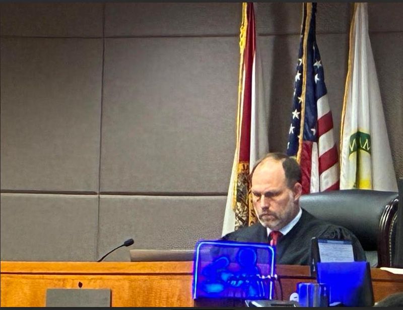 Circuit Judge Timothy McCourt.