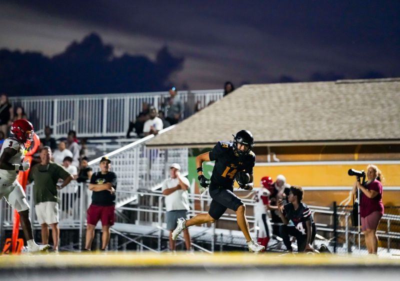 The Bishop Verot Vikings compete against the South Fort Myers Wolfpack in a spring football game at Bishop Verot High School in Fort Myers, Fla., on Friday, May 22, 2026.
