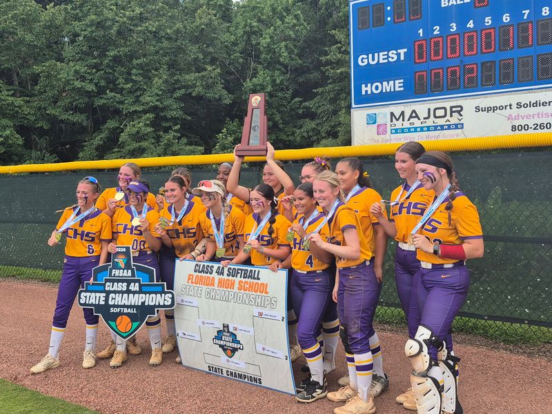 Columbia players hoist the trophy after defeating Lake Wales 3-2 for the FHSAA Class 4A high school softball championship in Longwood, Florida, on May 23, 2026.