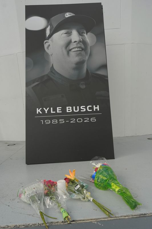 A makeshift memorial was made in front of the Daytona International Speedway tours building for NASCAR driver Kyle Busch, who died suddenly May 21, 2026.