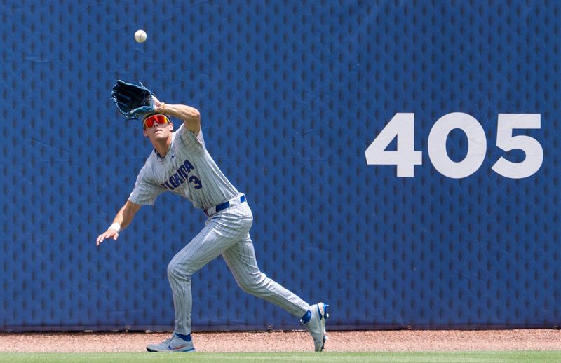 Florida Gators' Kyle Jones (3) catches a fly ball as Georgia Bulldogs take on Florida Gators during the SEC baseball tournament at Hoover Metropolitan Stadium in Hoover, Ala. on Saturday, May 23, 2026.