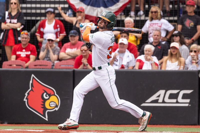 Miami outfielder Michael Torres watches a hit during the NCAA baseball Super Regional game 2 at Jim Patterson Stadium on June 7, 2025 in Louisville, Ky.