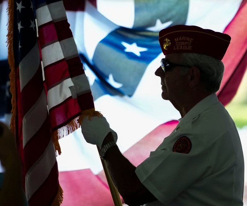Marine Corps League of Naples E.T. Brisson Detachment #063 exit after presenting the colors during a Memorial Day ceremony at Hodges Funeral Home at Naples Memorial Garden in Naples, Fla., on Monday, May 25, 2026.