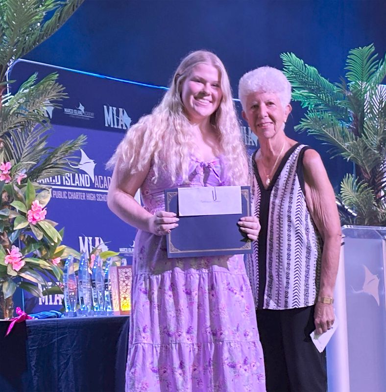 The Calusa Garden Club Scholarship Committee chairperson, Marianne Foley, with Catherine Taddei at Marco Island Academy’s awards night on May 19.