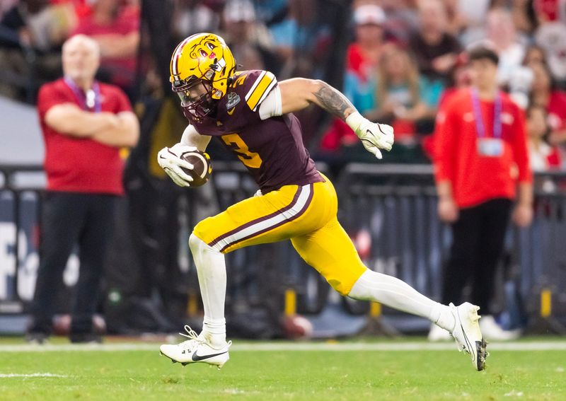 Dec 26, 2025; Phoenix, AZ, USA; Minnesota Golden Gophers defensive back Koi Perich (3) against the New Mexico Lobos during the Rate Bowl at Chase Field. Mandatory Credit: Mark J. Rebilas-Imagn Images