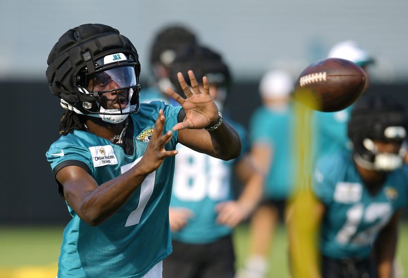 Jacksonville Jaguars wide receiver Brian Thomas Jr. (7) pulls in a pass on the fifth day of the NFL football training camp practice session Monday, July 29, 2024 at EverBank Stadium's Miller Electric Center in Jacksonville, Fla..