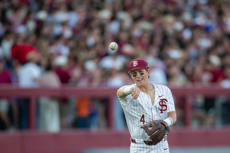 Florida State Seminoles infielder Cal Fisher (4) throws to first. The Florida State Seminoles hosted the Florida Gators at Dick Howser Stadium on Tuesday, April 7, 2026.
