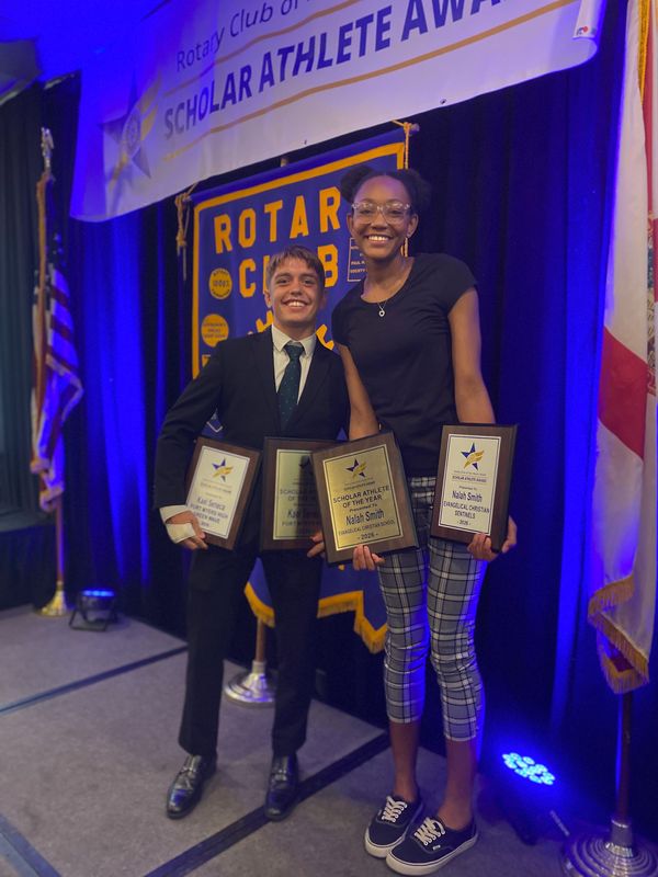 Fort Myers' Kael Seneca and ECS's Nalah Smith pose after being named 2026 Scholar Athletes of the Year at the Rotary South Club Scholar Athlete Banquet on May 26, 2026.