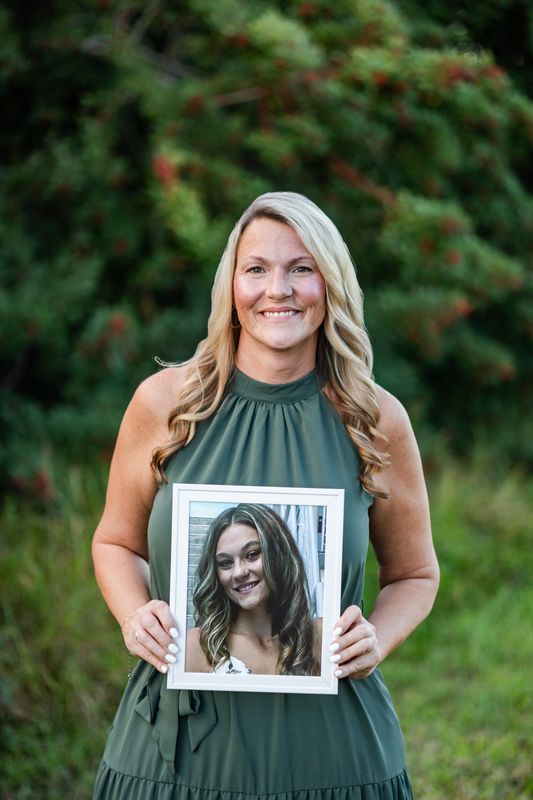 Erin NesSmith of Sarasota holds a photo of her daughter, Ashlynn, who died in 2024 at age 20. Ashlynn began vaping at age 14, which led to an addiction to nicotine and severe health problems that ultimately caused her death.