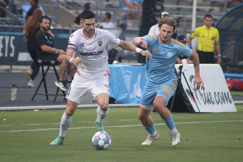 San Antonio FC defender Mitchell Taintor (3) and Sporting Jax midfielder Kieran Sadlier (10) challenge for possession during a USL Championship men's soccer game on May 27, 2026. [Clayton Freeman/Florida Times-Union]