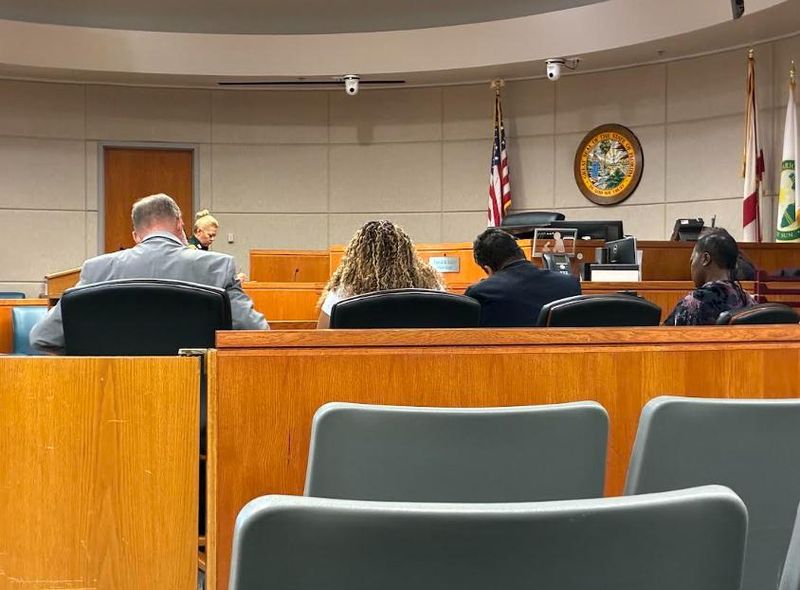 The defense table on May 27, 2026 during the trial of two women charged with child neglect.