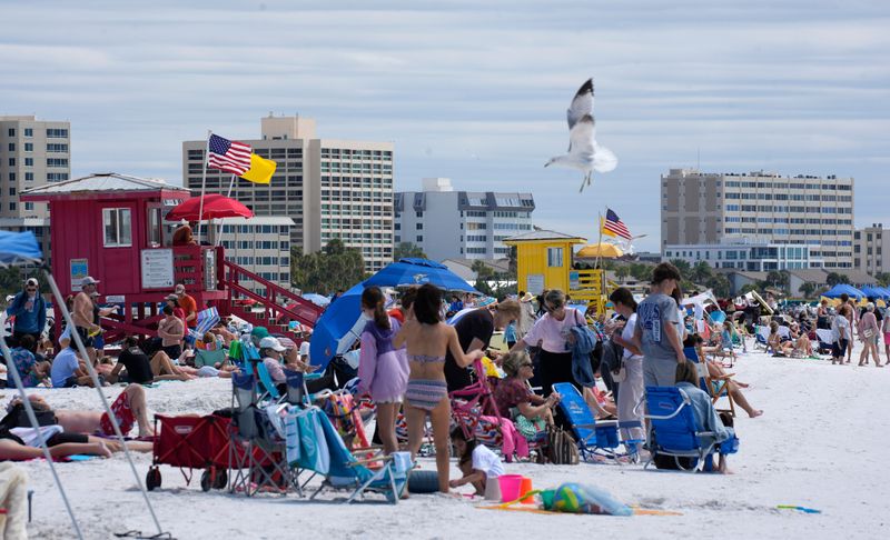Spring breakers enjoy Siesta Beach in March 2026.