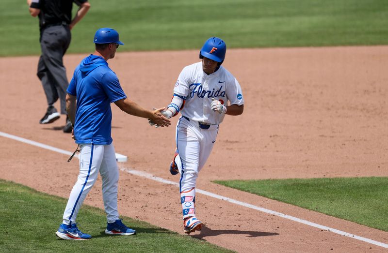 Florida infielder Landon Stripling (13) celebrates a home run against the Rider during the 2016 NCAA Baseball Championship Gainesville Regional baseball game at Condron Family Ballpark in Gainesville, FL on Friday, May 29, 2026. [Alan Youngblood/Gainesville Sun]