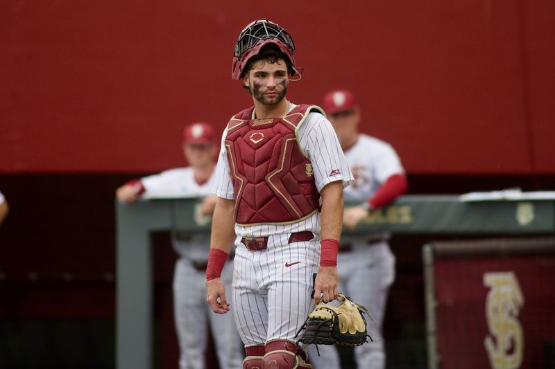 Hunter Carns pauses in between pitches as FSU baseball hosts St. John’s in the NCAA Tallahassee Regional on Friday, May 29, 2026 at Dick Howser Stadium.