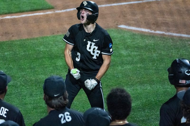 UCF Knights' Jordan Lodise (3) celebrates his home run as NC State Wolfpack take on UCF Knights during the NCAA Regional Baseball tournament at Plainsman Park in Auburn, Ala. on Friday, May 29, 2026.