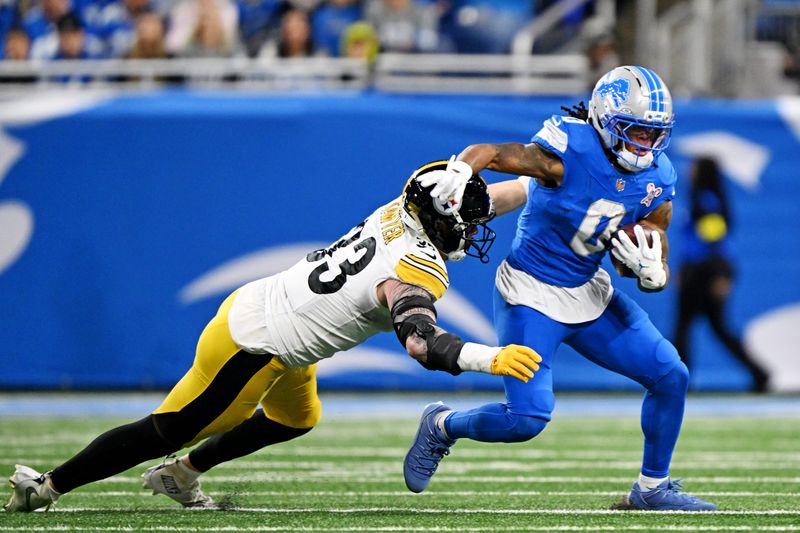 Dec 21, 2025; Detroit, Michigan, USA; Detroit Lions running back Jahmyr Gibbs (0) runs the ball during the first quarter against the Pittsburgh Steelers at Ford Field. Mandatory Credit: Lon Horwedel-Imagn Images