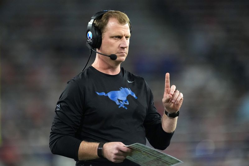 Jan 2, 2026; San Diego, CA, USA; SMU Mustangs head coach Rhett Lashlee gestures against the Arizona Wildcats in the first half during the Holiday Bowl at Snapdragon Stadium. Mandatory Credit: Kirby Lee-Imagn Images
