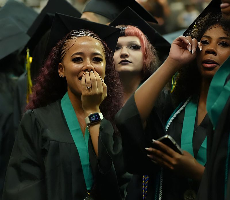 Pine Ridge High School's Class of 2026 is filled with emotion as graduates wave to their families at the start of commencement ceremonies, May 30, 2026, at the Ocean Center in Daytona Beach.