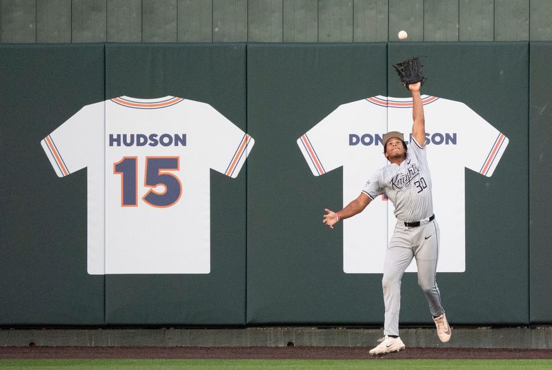 UCF Knights' John Smith III (30) catches a fly ball as Milwaukee Panthers take on UCF Knights during the NCAA Regional Baseball tournament at Plainsman Park in Auburn, Ala. on Saturday, May 30, 2026.