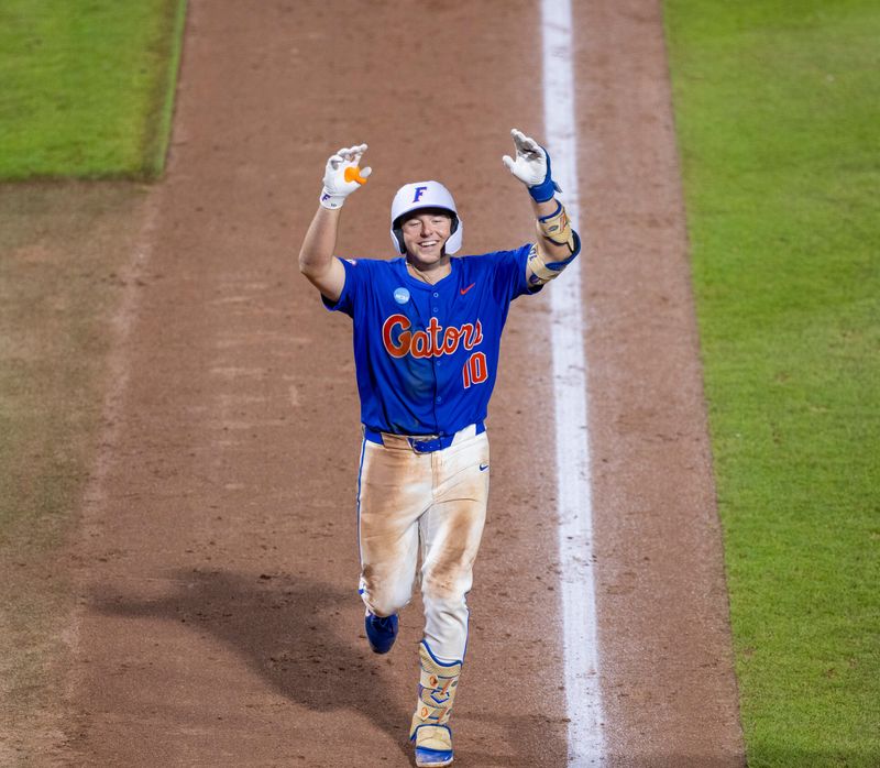 Florida's Ethan Surowiec (10) with a home run against Miami in the eighth in NCAA Gainesville Regionals at Condron Family Ballpark in Gainesville, Florida, Saturday, May 30, 2026. The Gators beat the Hurricanes 22-10. [Cyndi Chambers/ Gainesville Sun] 2026
