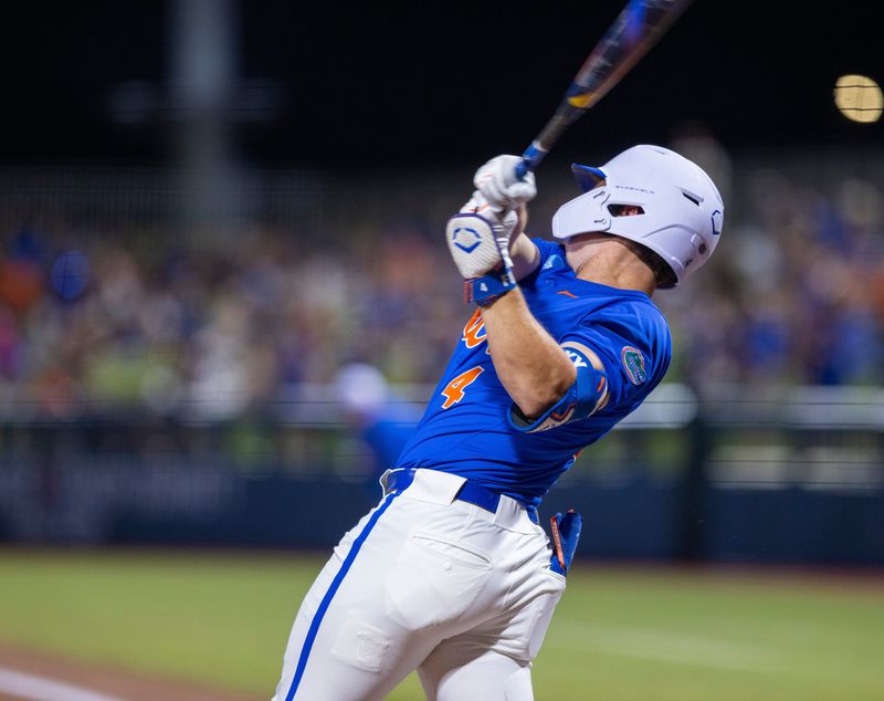 Florida's Cade Kurland (4) with a three run homer in the bottom of the first against Miami in NCAA Gainesville Regionals at Condron Family Ballpark in Gainesville, Florida, Saturday, May 30, 2026. The Gators beat the Hurricanes 22-10. [Cyndi Chambers/ Gainesville Sun] 2026