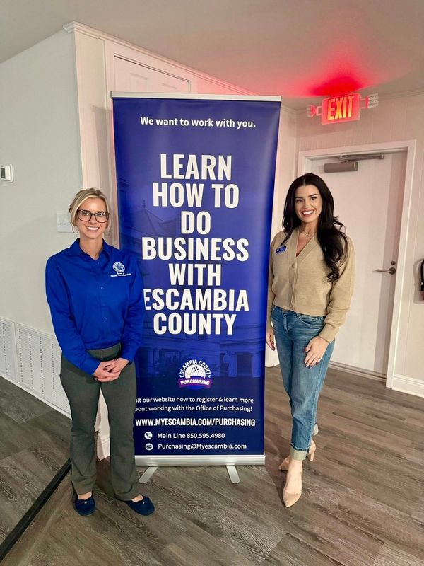 Commissioner Ashlee Hofberger (left) with her former aide Melanie Luna (right). Luna resigned from the position May 29. The move came after months of criticism over her connection to the controversial hiring of the new director of West Florida Public Libraries. Hofberger said Luna is not leaving as a direct result of the controversy.