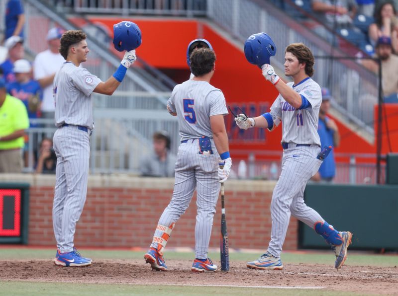 Florida celebrates a home run during the 2026 NCAA Baseball Championship Gainesville Regional championship baseball game at Condron Family Ballpark in Gainesville, FL on Sunday, May 31, 2026. [Alan Youngblood/Gainesville Sun]