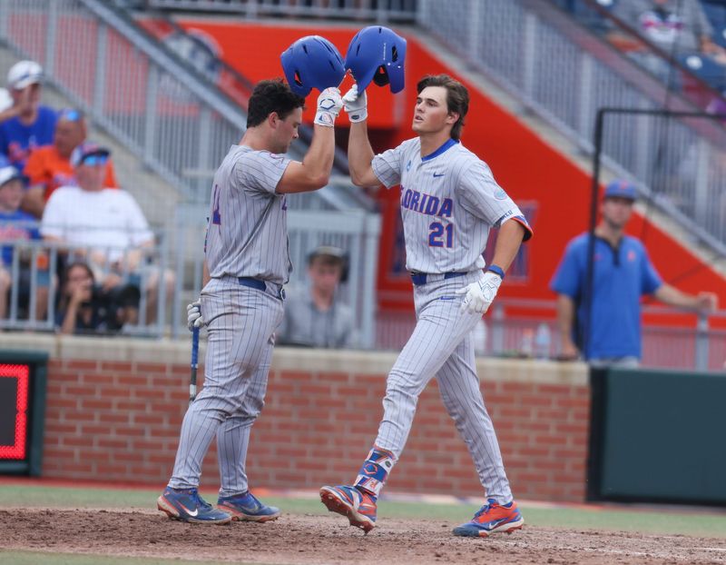 Florida utility Caden McDonald (21) celebrates a home run during the 2026 NCAA Baseball Championship Gainesville Regional championship baseball game at Condron Family Ballpark in Gainesville, FL on Sunday, May 31, 2026. [Alan Youngblood/Gainesville Sun]