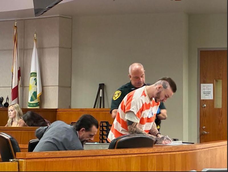 Christian Patrick Parker signed paperwork after his sentencing on June 1, 2026.