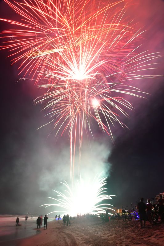 In 2018 fireworks lit the sky over the beach at Sidney Fischer Park in Cocoa Beach for the Fourth of July, though they were competing with a full Buck Moon rising over the ocean that year.