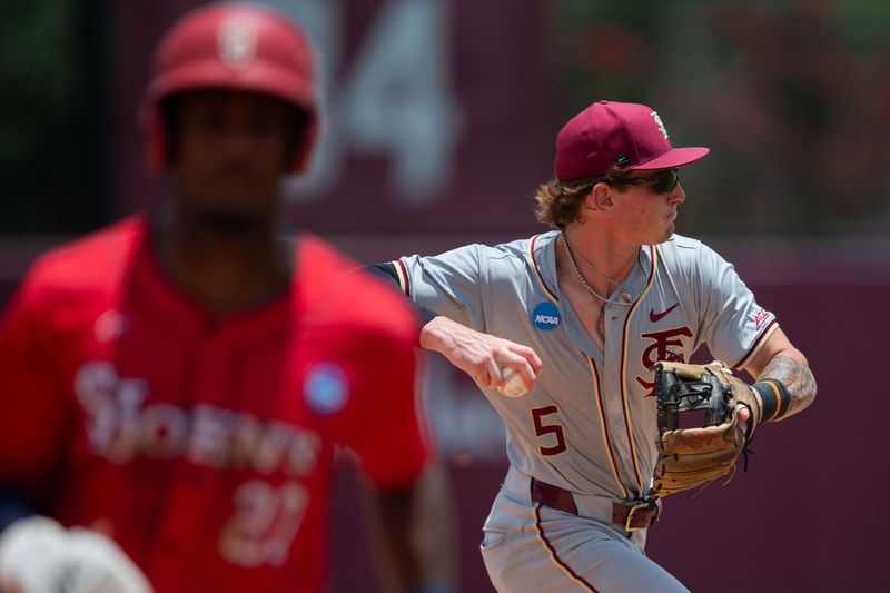 Florida State Seminoles infielder Gabe Fraser (5) throws to first. The St. John's Red Storm defeated the Florida State Seminoles 5-4 in the Tallahassee Regional finals at Dick Howser Stadium on Monday, June 1, 2026.