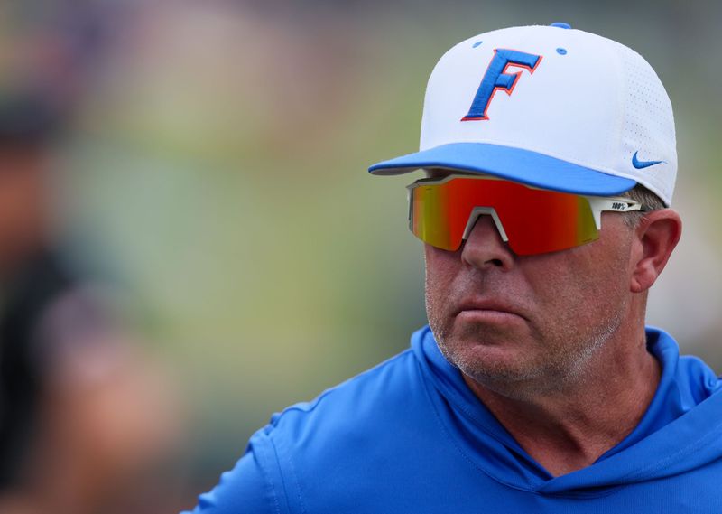 Florida head coach Kevin O'Sullivan watches warm ups before the 2026 NCAA Baseball Championship Gainesville Regional championship baseball game at Condron Family Ballpark in Gainesville, FL on Monday, June 1, 2026. Troy beat Florida Sunday they played a winner take all game Monday. [Alan Youngblood/Gainesville Sun]