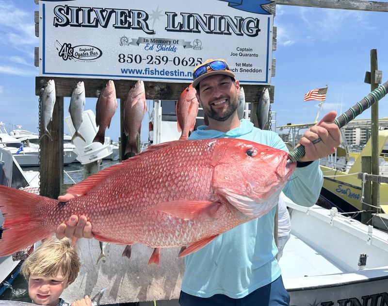 Tucker Anderson of Tennessee shows off 15-plus pound red snapper he caught on June 1 aboard the Silver Lining with Capt. Joe Quaranto.