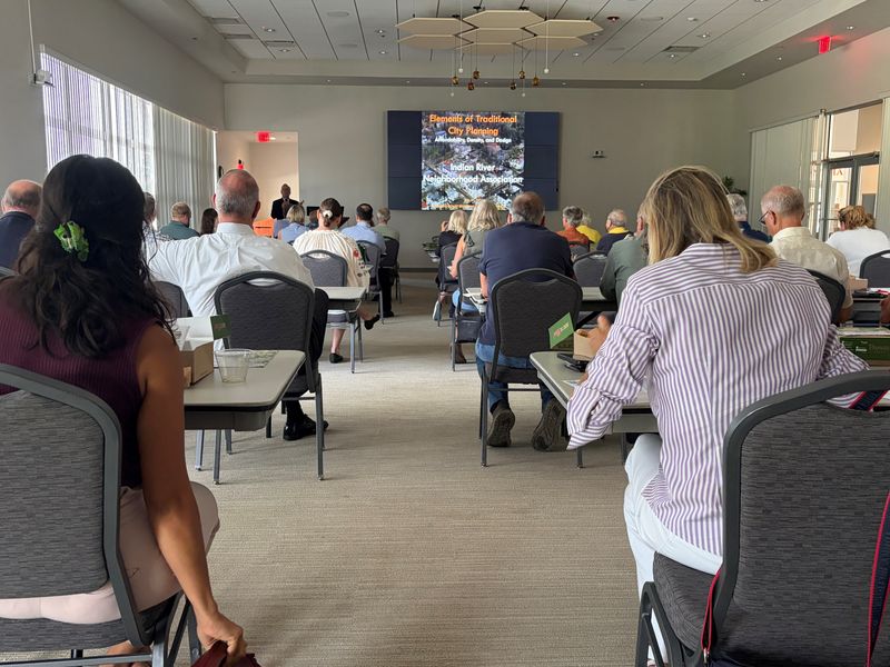 Dana Little, front left, urban design director of the Treasure Coast Regional Planning Council, speaks to a packed crowd May 27, 2026, at the Indian River County Intergenerational Recreation Center.