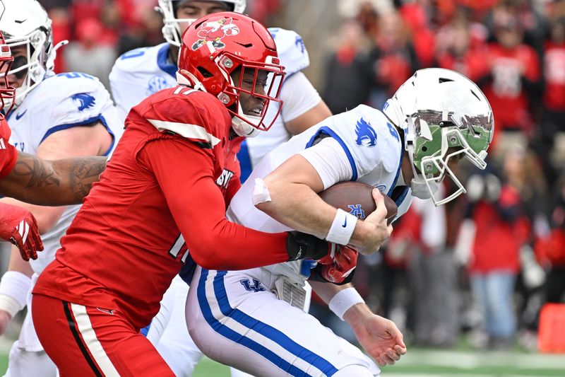 Nov 29, 2025; Louisville, Kentucky, USA; Louisville Cardinals defensive lineman AJ Green (17) sacks Kentucky Wildcats quarterback Cutter Boley (8) during the first half at L&N Federal Credit Union Stadium. Mandatory Credit: Jamie Rhodes-Imagn Images