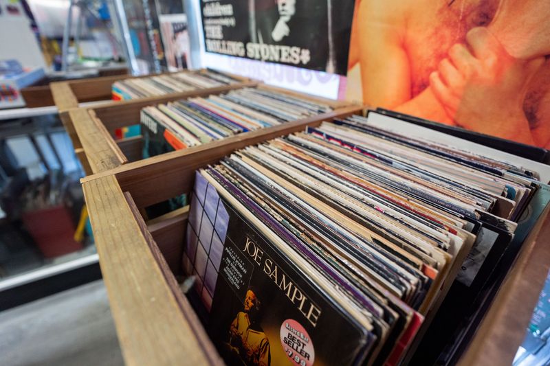 Vinyl records for sale at Real Cool Time Records are displayed in crates for customers to flip through as seen on Wednesday, June 3, 2026.
