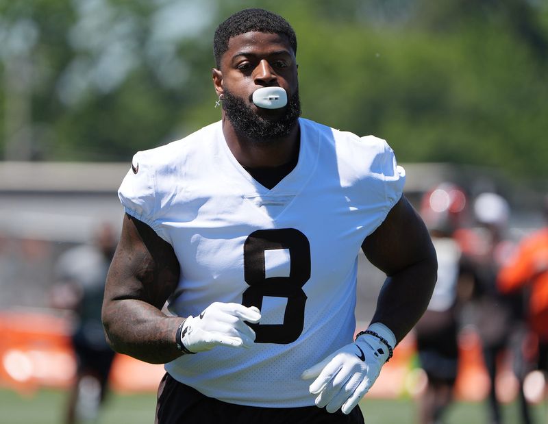 Cleveland Browns Jared Verse jog onto the field for team OTAs at CrossCountry Mortgage Campus of the Cleveland Browns in Berea, Ohio on June 2, 2026.