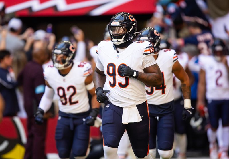 Nov 3, 2024; Glendale, Arizona, USA; Chicago Bears defensive tackle Gervon Dexter Sr. (99) against the Arizona Cardinals at State Farm Stadium. Mandatory Credit: Mark J. Rebilas-Imagn Images
