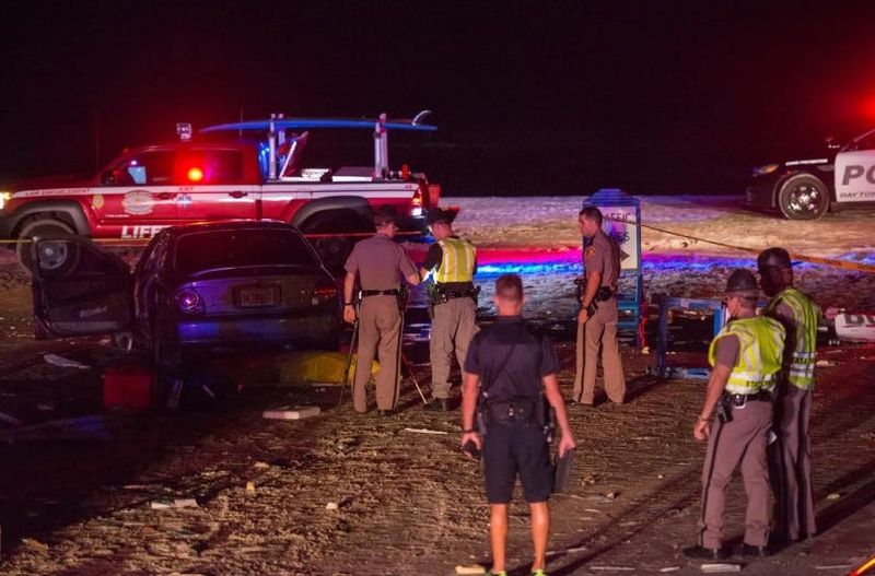 A file photo shows the scene on June 24, 2014, after a car crashed through a gate and tollbooth on the Dunlawton beach access ramp in Daytona Beach Shores and struck and killed Elizabeth Braly.